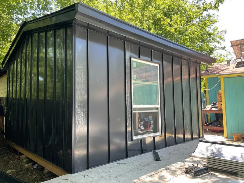 Black standing seam metal wall panels for Metal Roof Installation in Florissant