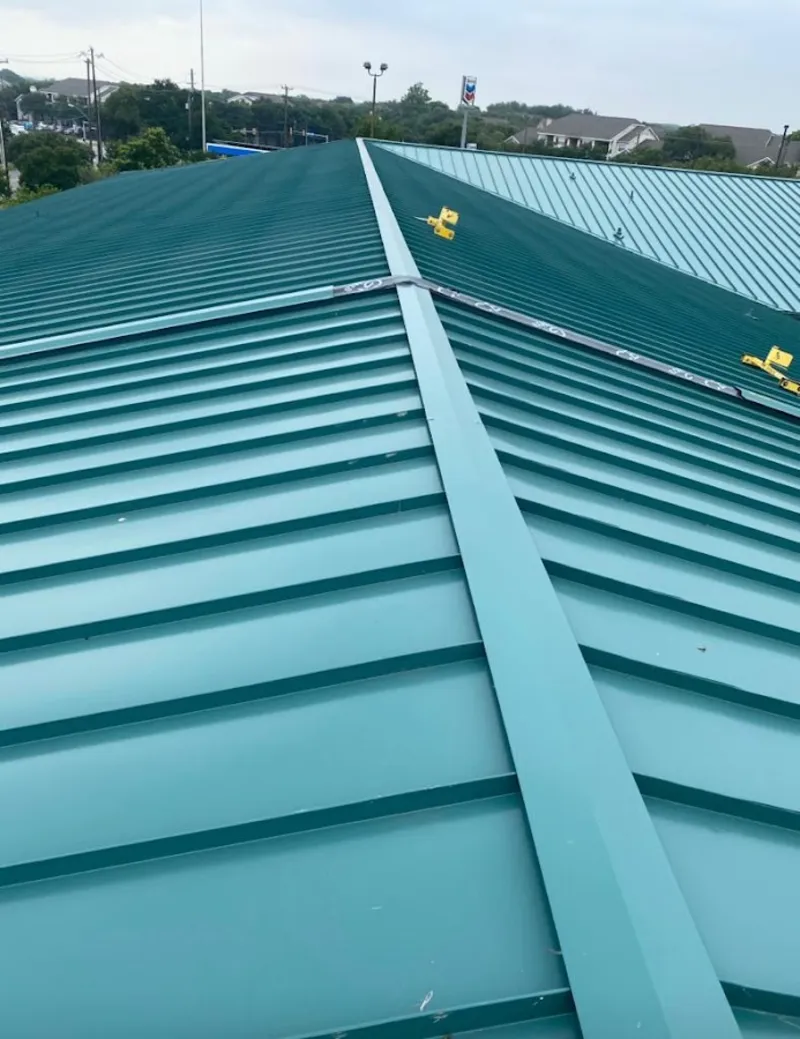 Green commercial metal roof ridge and valley for Metal Roof Repair in Florissant