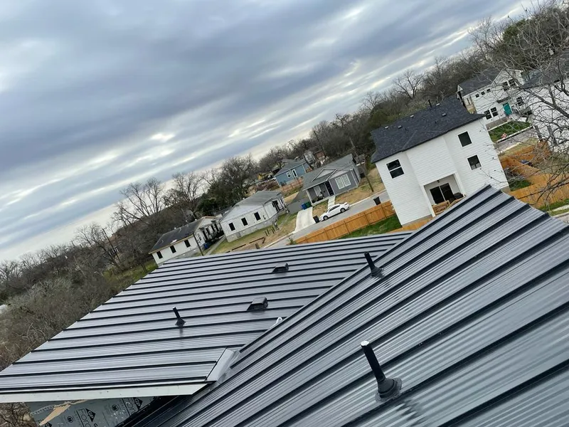 Standing seam metal roof panels with vents for Skylight Repair in Florissant